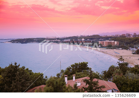 Turkish Riviera Or Turquoise Coast. Popular Touristic Coastline. Sunrise View Above Mediterranean Coast Of Antalya And Alanya. Travel To Turkey. Favorable Climate, Warm Sea, Mountainous. Morning time Turkish Riviera Or Turquoise Coast. Popular Touristic Coastline. Sunrise View Above Mediterranean Coast Of Antalya And Alanya. Travel To Turkey. Favorable Climate, Warm Sea, Mountainous. Morning time 135626609