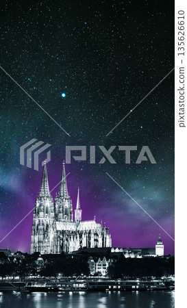 Cologne, Germany. Night View Of Cologne Cathedral. Catholic Gothic Cathedral In Night. UNESCO World Heritage Site. Toned Photo Black, White And Ultra Violet Colors . Night starry stars sky. 135626610