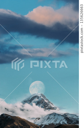 Georgia. Peak Of Mount Kazbek Covered With Snow. Kazbek Is A Stratovolcano And One Of Major Mountains Of Caucasus. Beautiful Georgian Nature Landscape In Early Winter. 135626663