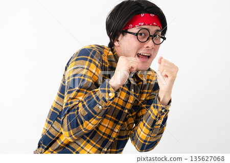 Young man wearing checked clothes 135627068