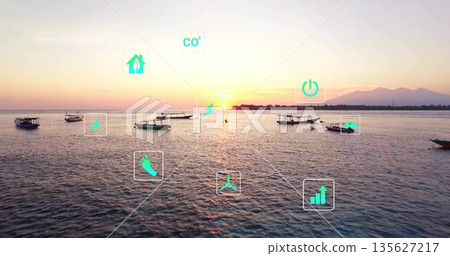 Floating small motorboats anchored on coastal bay water at sunset, with overlay green-tinged icons 135627217