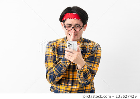 Young man wearing checked clothes Young man wearing checked clothes 135627429