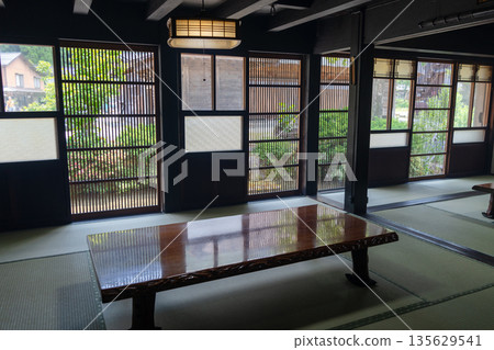 Interior of a traditional wooden house in Shirakawa-go, Japan Interior of a traditional wooden house in Shirakawa-go, Japan 135629541