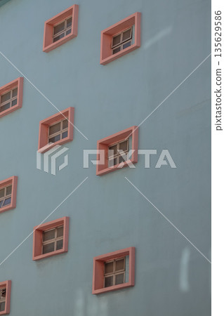Sept 14 2025 Modern Building Facade with Small Square Windows in Minimalist Design Sept 14 2025 Modern Building Facade with Small Square Windows in Minimalist Design 135629586