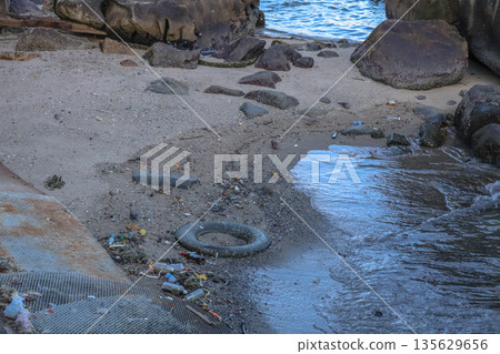 Sept 14 2025 Polluted Beach Showing Litter and Debris Close to Ocean Shoreline Sept 14 2025 Polluted Beach Showing Litter and Debris Close to Ocean Shoreline 135629656