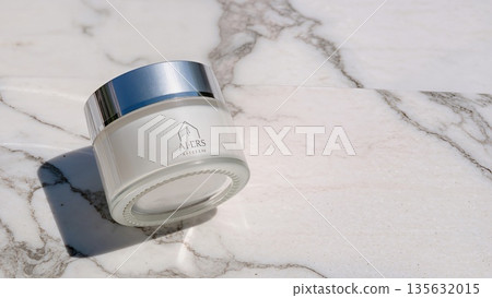 Face cream moisturiser, glass jar on marble stone background, skincare and cosmetic, beauty product concept Face cream moisturiser, glass jar on marble stone background, skincare and cosmetic, beauty product concept 135632015