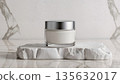 Face cream moisturiser, glass jar on marble stone background, skincare and cosmetic, beauty product concept 135632017