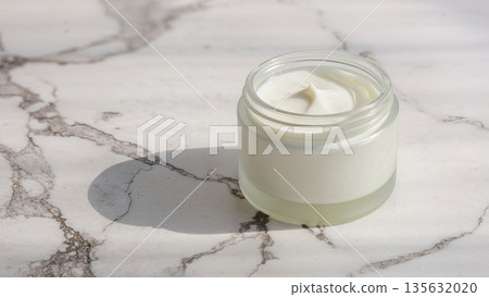 Face cream moisturiser, glass jar on marble stone background, skincare and cosmetic, beauty product concept Face cream moisturiser, glass jar on marble stone background, skincare and cosmetic, beauty product concept 135632020
