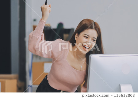 Starting small businesses SME owners female entrepreneurs check online orders to prepare to pack the boxes, sell to customers, sme business ideas online. 135632808
