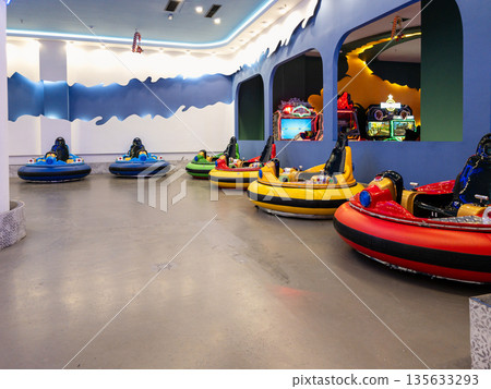 Yerevan Armenia 1.10.2026. A row of bumper cars are lined up in a room 135633293