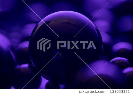 A close up of a purple ball with a dark background 135633321
