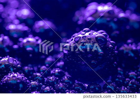 A close up of a purple sphere with many other spheres surrounding it A close up of a purple sphere with many other spheres surrounding it 135633433
