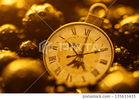 A gold pocket watch with roman numerals on the face A gold pocket watch with roman numerals on the face 135633435