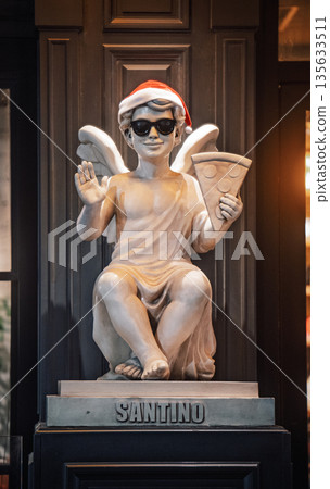 Yerevan Armenia 1.5.2026. A statue of a man holding a pizza and wearing sunglasses Yerevan Armenia 1.5.2026. A statue of a man holding a pizza and wearing sunglasses 135633511