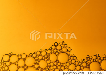 A large number of small bubbles in various sizes, creating a sense of movement A large number of small bubbles in various sizes, creating a sense of movement 135633560
