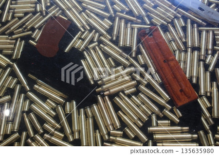 machine gun and cartridges. The concept of illicit arms transfers. machine gun and cartridges. The concept of illicit arms transfers. 135635980