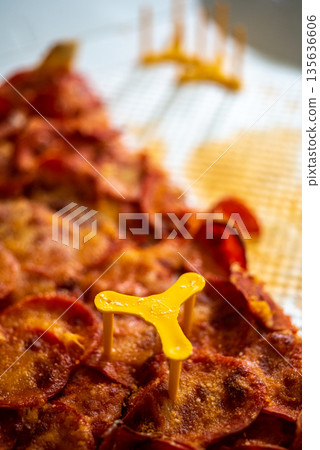 Pepperoni Pizza Slice with Yellow Pizza Saver Pepperoni Pizza Slice with Yellow Pizza Saver 135636606