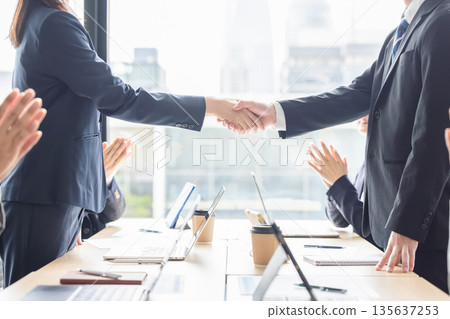 business people shaking hands 135637253