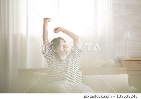 Woman waking up 135638245