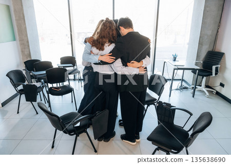 People are in group psychological support room together People are in group psychological support room together 135638690