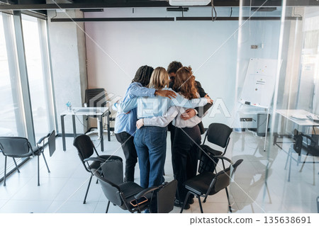 People are in group psychological support room together People are in group psychological support room together 135638691