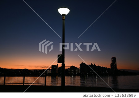 Street lights and coastal night view 135638699