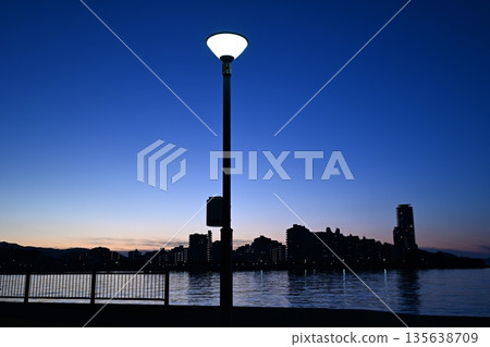 Street lights and coastal night view 135638709