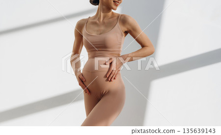 Pregnant woman is indoors Pregnant woman is indoors 135639143