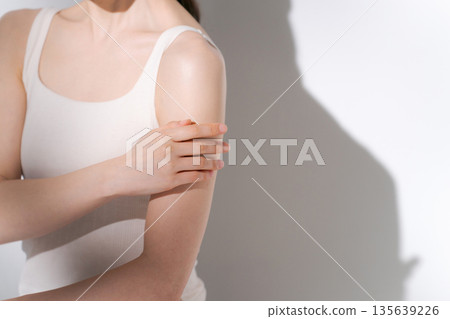 Beautiful woman doing body care 135639226