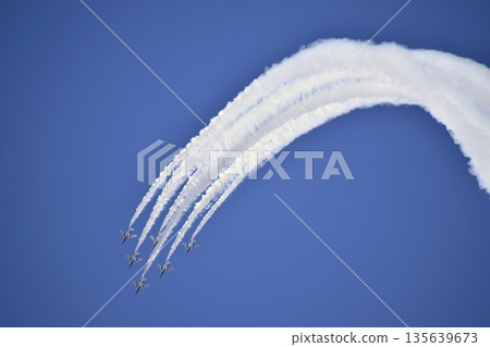 Blue Impulse flying in the blue sky Blue Impulse flying in the blue sky 135639673