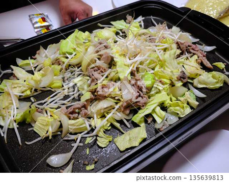 Cooking Yakisoba at a food stall 135639813