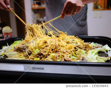 Cooking Yakisoba at a food stall 135639843