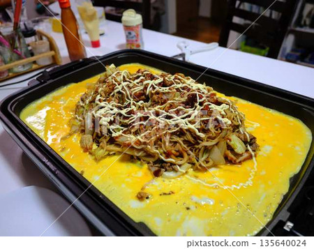 Cooking Yakisoba at a food stall 135640024