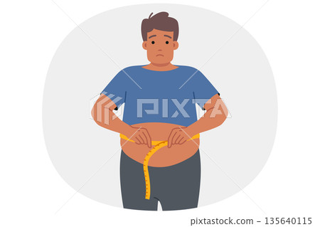 Fat man suffering from obesity measures waist and sadly looks at screen, looking for help Fat man suffering from obesity measures waist and sadly looks at screen, looking for help 135640115