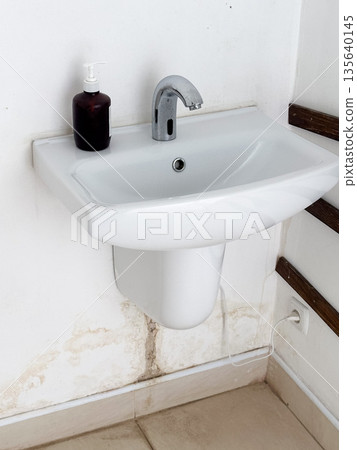 Bathroom sink with soap dispenser and faucet. Bathroom sink with soap dispenser and faucet. 135640145