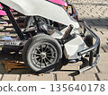 Close-up of go-kart wheels 135640178