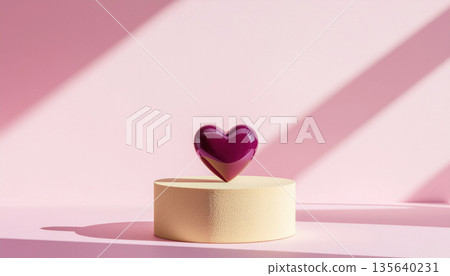 Shiny burnished lilac ceramic heart sits on beige pedestal against pink background with soft shadows Shiny burnished lilac ceramic heart sits on beige pedestal against pink background with soft shadows 135640231
