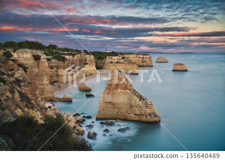 Lagos beach rocks and sunset 135640489