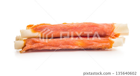 Dog food. Snack sticks for dogs isolated on white background. Dog food. Snack sticks for dogs isolated on white background. 135640602