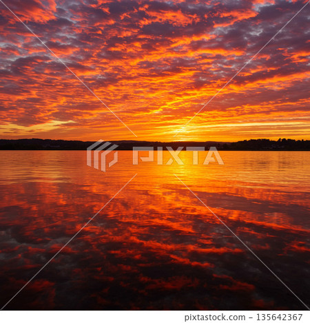 sunset over the lake 135642367