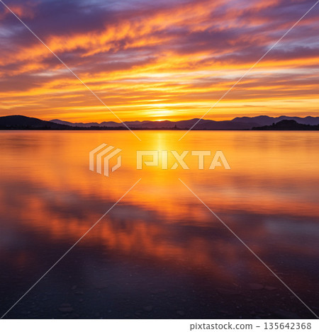 beautiful sunset over the lake beautiful sunset over the lake 135642368