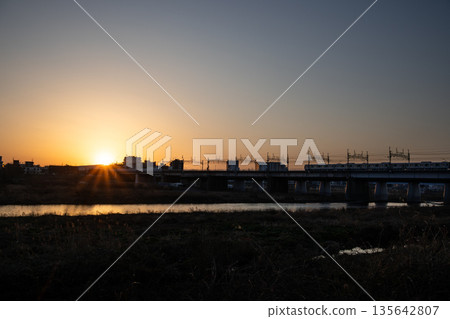 Winter sunset on the Tama River riverbank Winter sunset on the Tama River riverbank 135642807