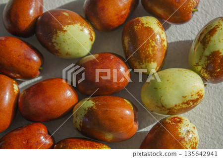 These are dates that are ripening red. These are dates that are ripening red. 135642941