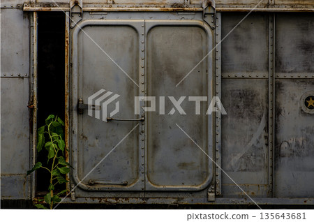 Vintage railroad container doors without rusty and old color at station. 135643681
