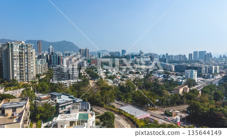 Jan 15 2026 Bright Daylight Illuminates Urban Skyline Across Kowloon Tong North 135644149
