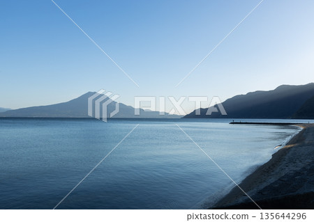 View of Kinko Bay and Sakurajima from Shigetomi Beach in Aira City, Kagoshima Prefecture 135644296