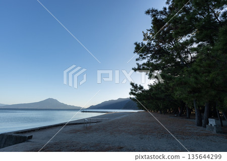 View of Kinko Bay and Sakurajima from Shigetomi Beach in Aira City, Kagoshima Prefecture View of Kinko Bay and Sakurajima from Shigetomi Beach in Aira City, Kagoshima Prefecture 135644299