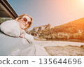 Woman Car Window Scenic Landscape Enjoying Scenic Drive Through Mountain Range 135644696