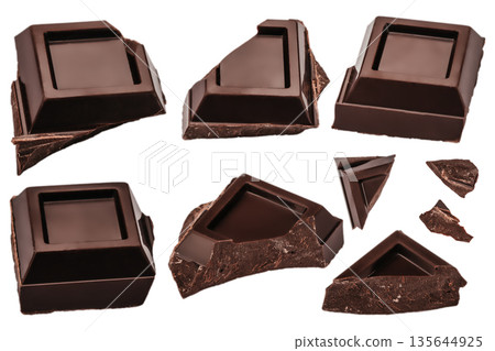 Broken dark chocolate pieces isolated on white background 135644925