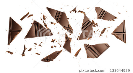Broken dark chocolate pieces isolated on white background 135644929